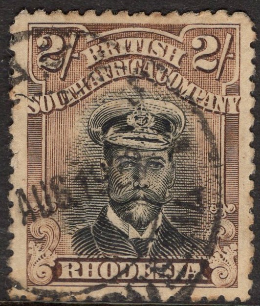 RHODESIA-1922-23 2/- Black & Brown Sg 301 GOOD USED | Imperium Stamps Ltd