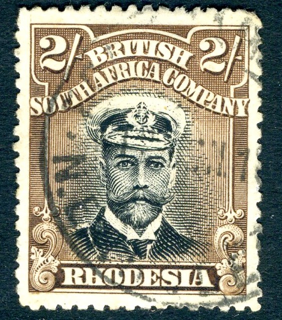 RHODESIA-1913-19 2/- Black & Brown Sg 218 GOOD USED | Imperium Stamps Ltd